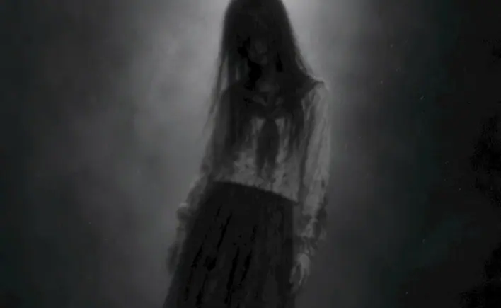 Concept art of Hanako-san: a faceless schoolgirl in a misty corridor