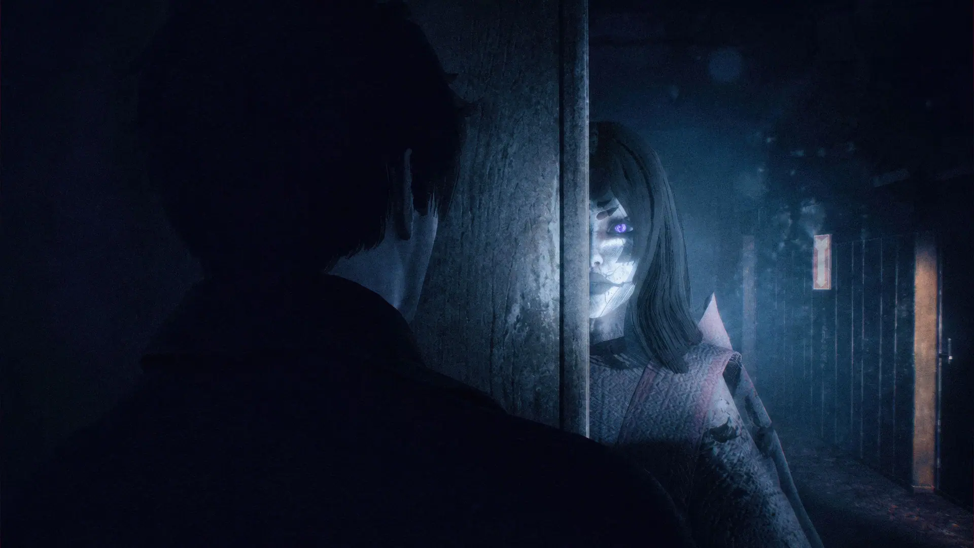 A pale spirit waits beside a doorway as an investigator looks on.